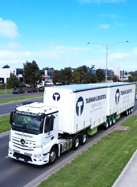 White truck driving on the road | Road Transport Australia | Tasman Logistics Services