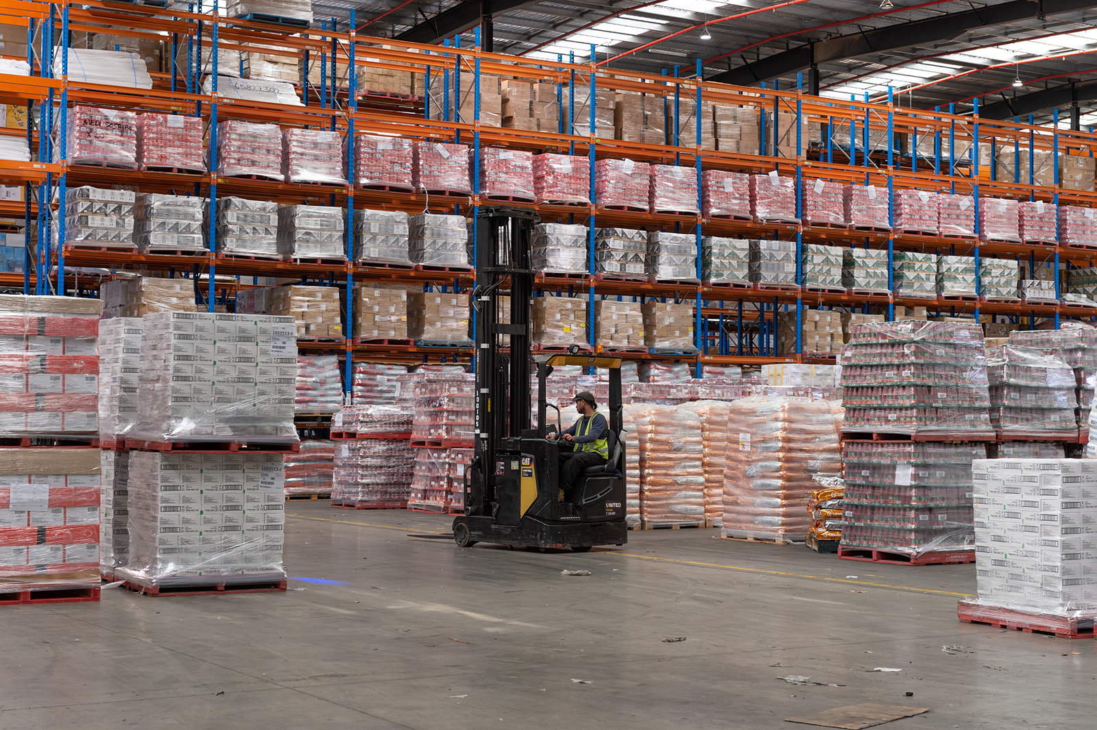 Forklift maneuvering boxes in a warehouse | Flex Warehouse Space | Tasman Logistics Services