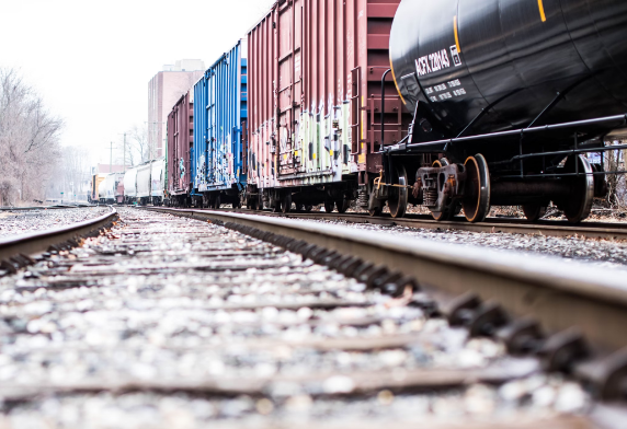 Cargo train moving swiftly on the tracks | Rail Freight Australia | Tasman Logistics Services