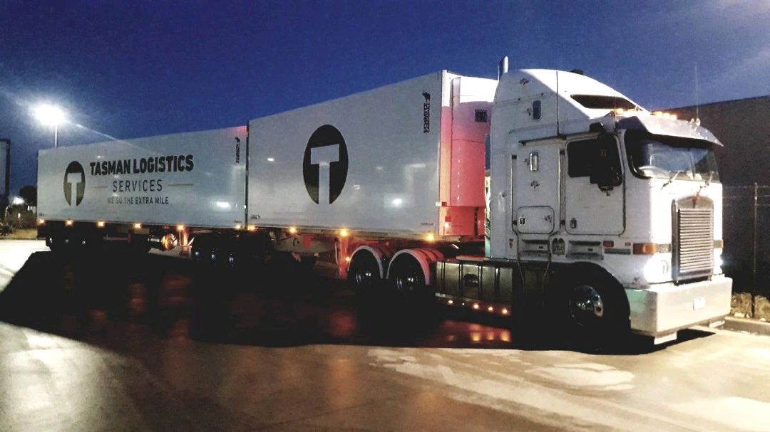 Night scene showing a big semi truck | Road Transport | Tasman Logistics Services