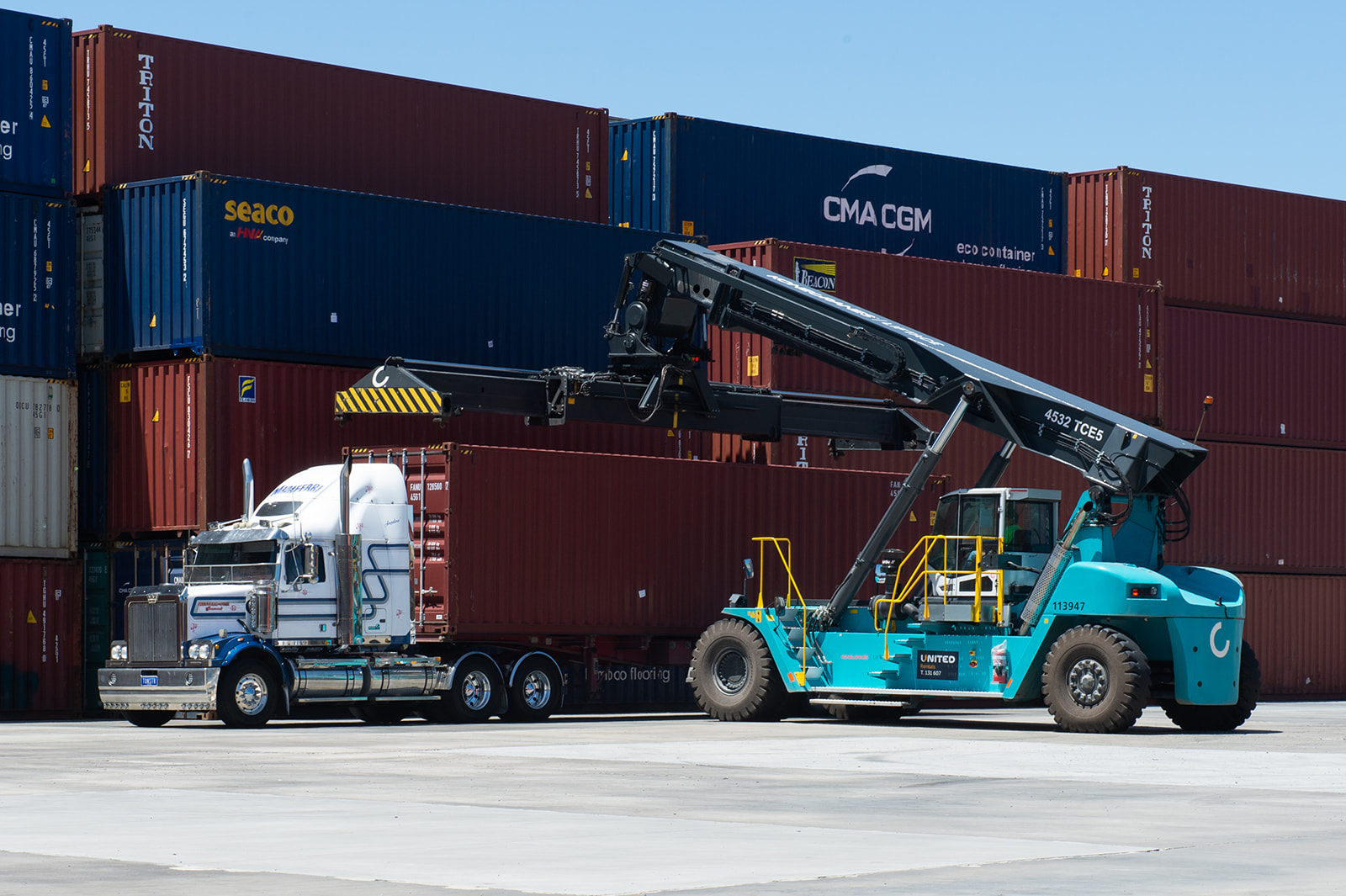 Crane ready for container lifting | Road Transport | Tasman Logistics Services